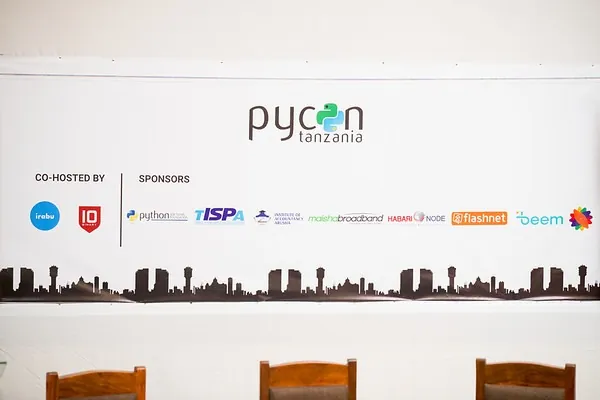 The PyCon Tanzania partner wall listing co-hosts and sponsors
