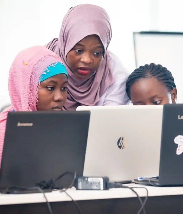 Attendees working through a hands-on workshop session at PyCon Tanzania
